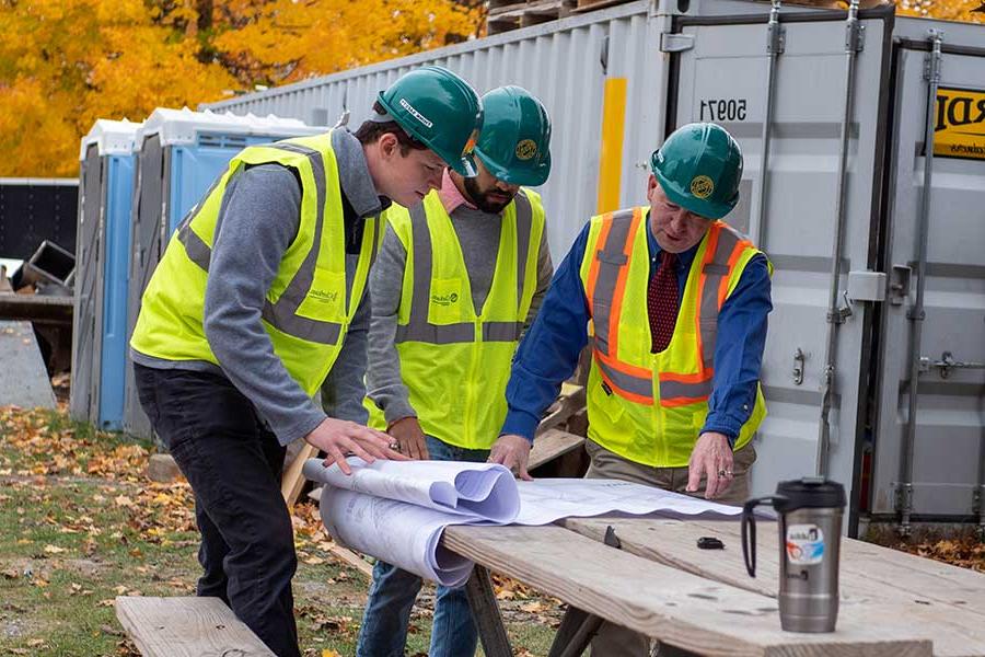 Students working with construction plans